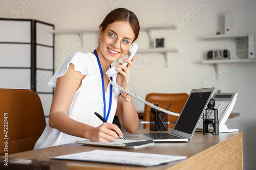 Female notary public talkin...