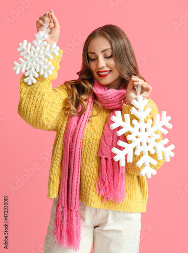 Smiling woman in warm cloth...