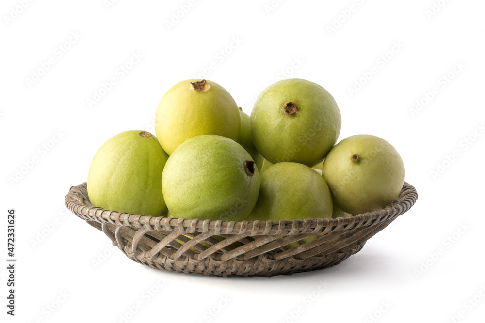 guava fruit in a basket, isolated on white background, common tropical fruit closeup view guava fruit in a basket, isolated on white background, common tropical fruit closeup view