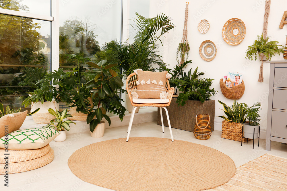 Fototapeta premium Room interior with stylish furniture and green plants