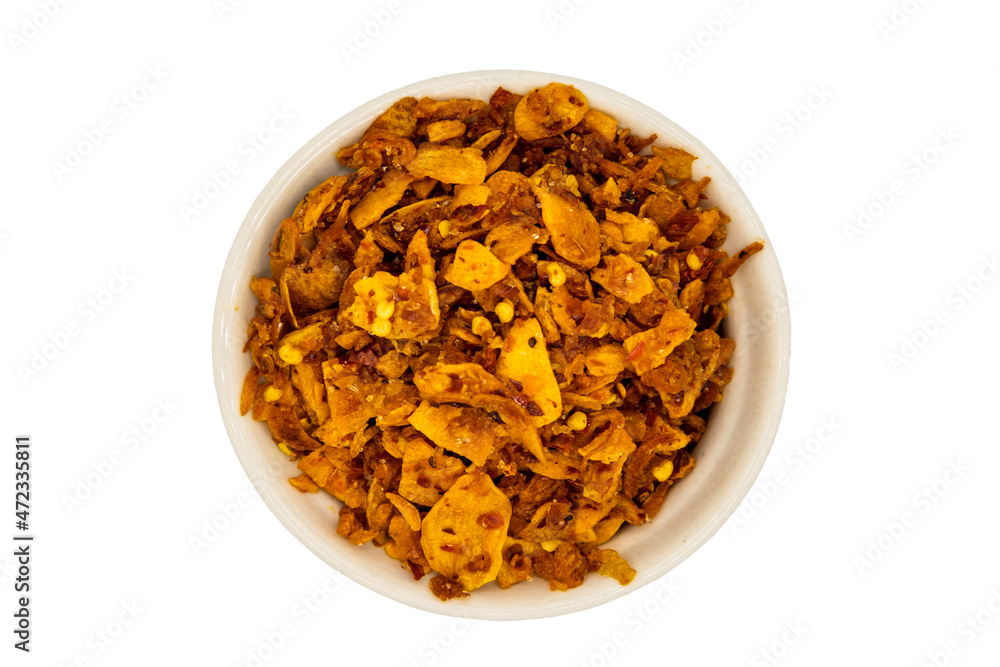 Dried chilli paste with crispy shrimp thai style or Crispy shrimp chilli paste in ceramic white cup isolated on white background with clipping path. Top view, Selective focus. Dried chilli paste with crispy shrimp thai style or Crispy shrimp chilli paste in ceramic white cup isolated on white background with clipping path. Top view, Selective focus.