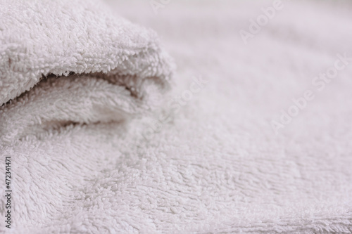 White towel macro, soft bath blurred background, fabric material, copy space