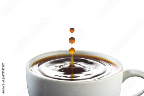 White cup with two drops coffee splash.on white background.