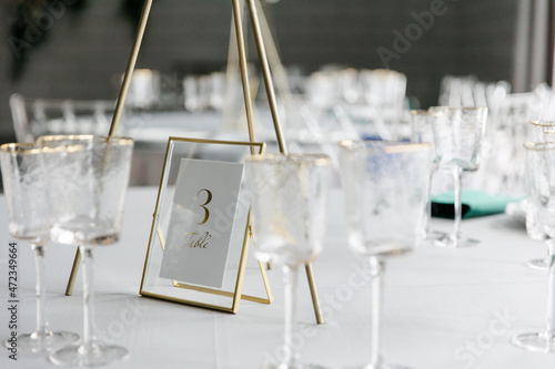 metal frame with glass. a number for a set table. the concept of the holiday.
