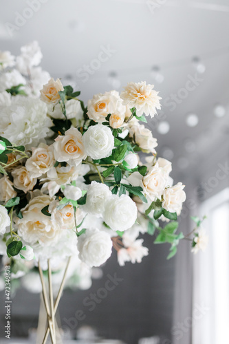 large flower arrangements for the wedding decor of the hall. the concept of a holiday and celebration.