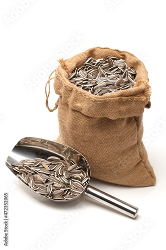 Fotografie Sunflower seeds isolated on white background