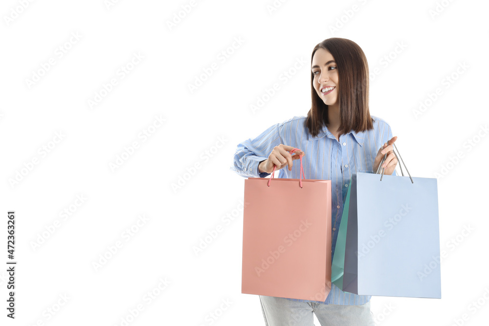 Woman with shop bags isolated on white background Woman with shop bags isolated on white background