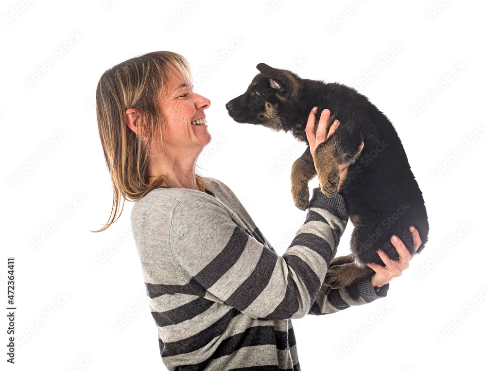 Obraz premium puppy german shepherd and owner
