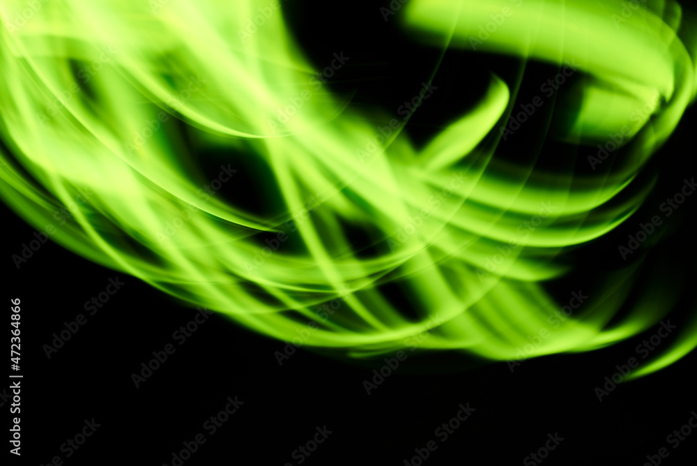 Naklejka premium Green plexus light on a black background