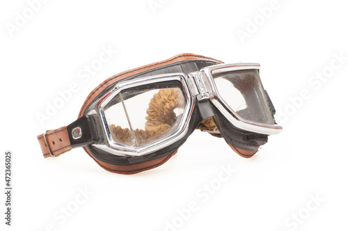 Vintage leather aviation glasses on white background