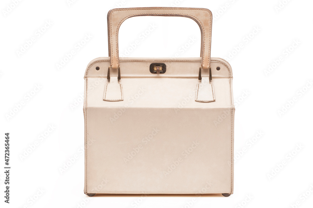 Old fashioned white handbag on white background Old fashioned white handbag on white background