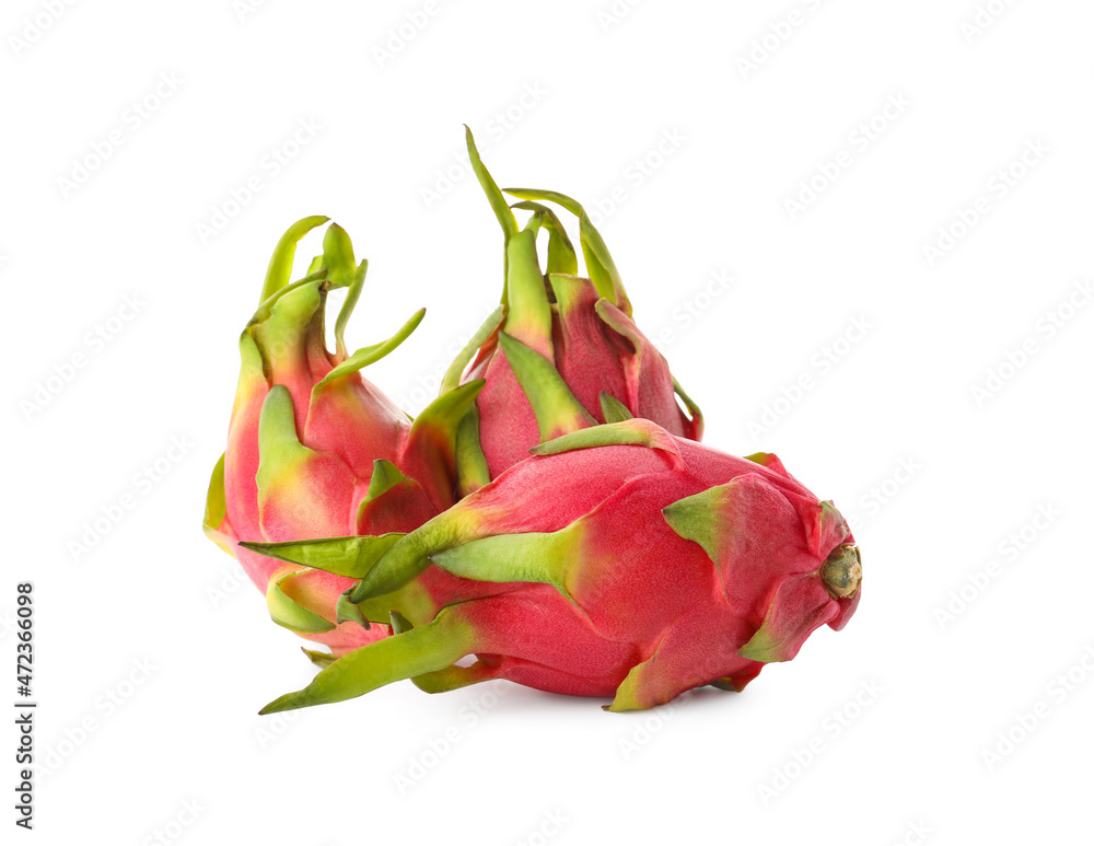 Fototapeta premium Delicious pink dragon fruits (pitahaya) on white background