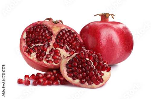 Ripe pomegranates on white background. Delicious fruits