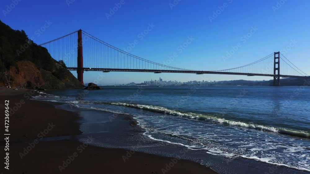 Golden Gate Bridge and beach along the Pacifica Ocean in the San Francisco Bay Area. Golden Gate Bridge and beach along the Pacifica Ocean in the San Francisco Bay Area.