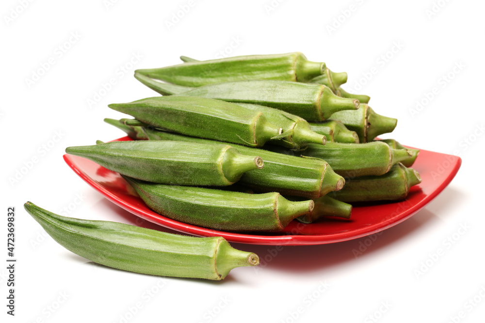 Fresh young okra isolated on white background Fresh young okra isolated on white background