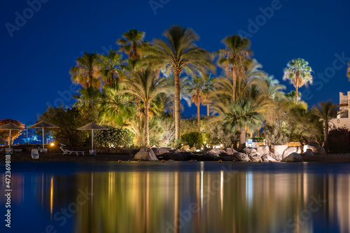 Calm beach on the red sea at night in Sharm El Sheikh, Egypt © OlegD