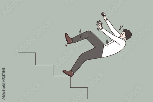 Business crisis and failure concept. Young stressed businessman manager falling down from ladder stairs feeling panic and fear vector illustration 