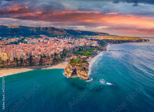 Fototapeta Naklejka Na Ścianę i Meble -  Gloomy morning cityscape of Tropea town before the rain, Italy, Europe. Dramatic summer scene of east coast of Calabria. Traveling concept background.