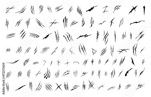 Collection of black scratches isolated on white background.