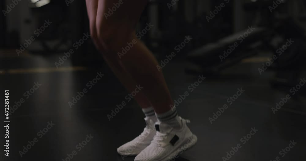 Slow motion woman make jumping rope in a gym Slow motion woman make jumping rope in a gym