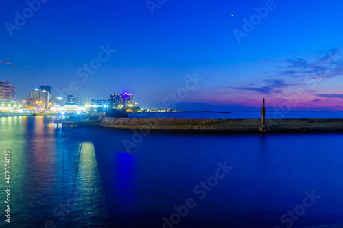 Port compound, and the beach front skyline. Tel-Aviv © RnDmS