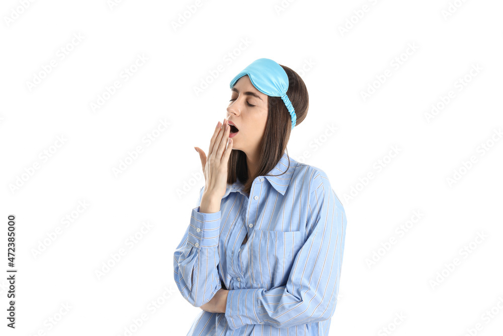 Attractive woman in sleep mask isolated on white background Attractive woman in sleep mask isolated on white background