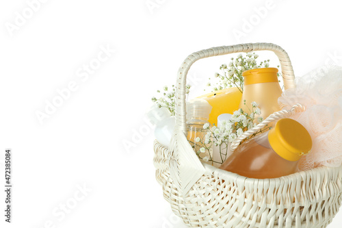 Gift basket with cosmetics isolated on white background