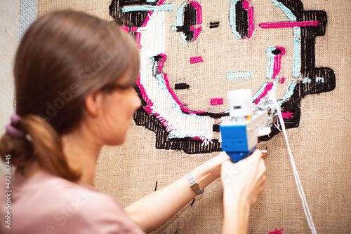 The process of making tufting carpet smile handmade to order at home.