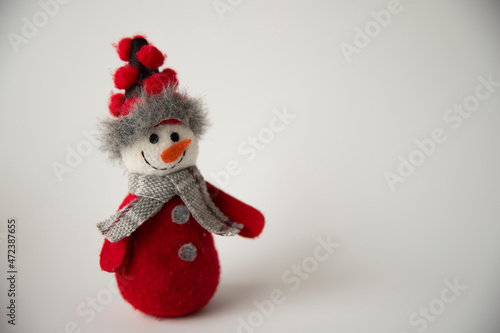 a snowman waiting for the new year on a white background
