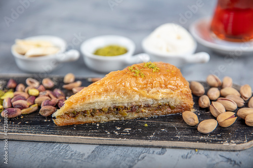 Carrot Slice Baklava (Turkish: Havuc Dilim Baklava) on tray. Traditional Baklava from Gaziantep, Turkey. Baklava with pistachio. photo