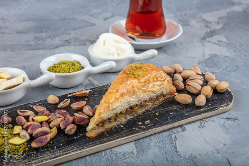 Carrot Slice Baklava (Turkish: Havuc Dilim Baklava) on tray. Traditional Baklava from Gaziantep, Turkey. Baklava with pistachio. photo