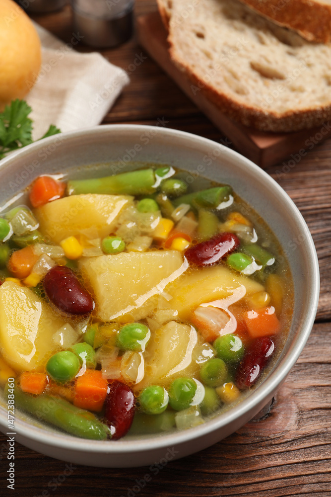 Bowl of delicious turnip soup on wooden table Bowl of delicious turnip soup on wooden table