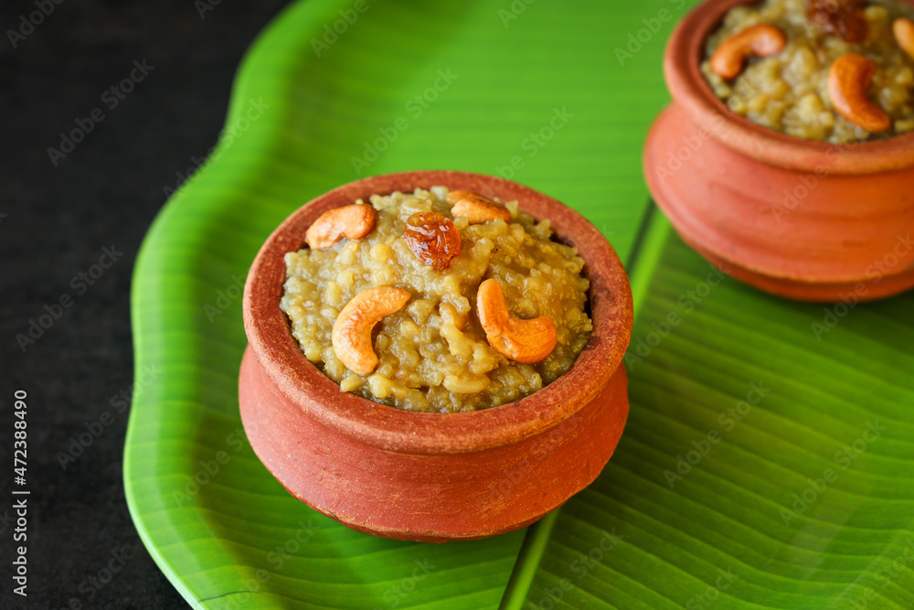 Sakkarai pongal Indian festival food traditional popular mithai sweet pongal dessert made on the festival day of Pongal Makar Sankranti vishu Diwali India.
Sakkarai pongal Indian festival food traditional popular mithai sweet pongal dessert made on the festival day of Pongal Makar Sankranti vishu Diwali India.