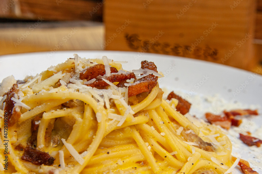 Pasta alla carbonara is a characteristic dish of Lazio, and more particularly of Rome, prepared with popular ingredients such as eggs, pecorino cheese and pepper and with an intense flavor. Pasta alla carbonara is a characteristic dish of Lazio, and more particularly of Rome, prepared with popular ingredients such as eggs, pecorino cheese and pepper and with an intense flavor.