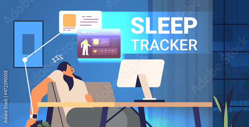 tired woman with electronic smart watch app tracker on hand sleeping at workplace quality and quantity sleep control