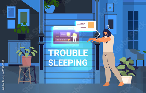 tired woman with electronic smart watch app tracker on hand quality and quantity sleep control concept