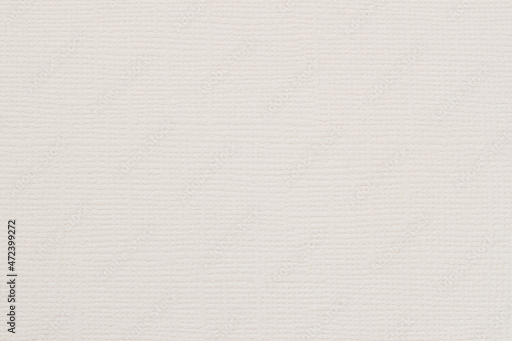 Close-up of canvas texture with delicate grid pattern, cream color Close-up of canvas texture with delicate grid pattern, cream color