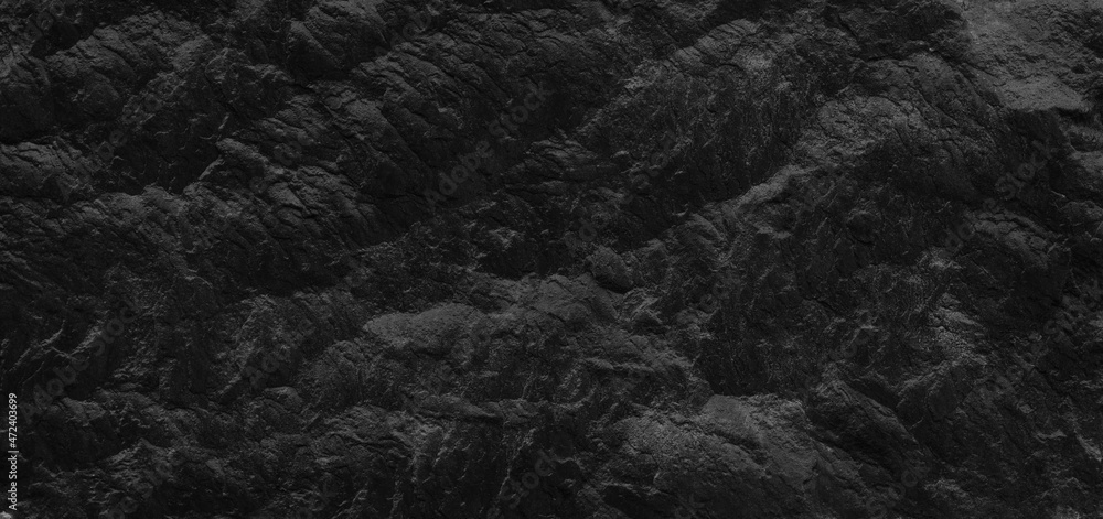 Fototapeta premium Dark gray stone background with copy space. Black grunge banner with rock texture.