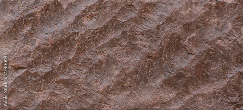 Closeup shot of rock surface with vignette at cover idea for background or backdrop.