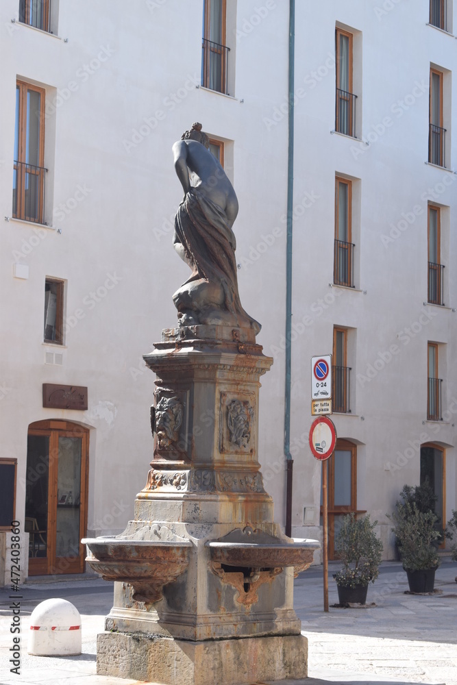 Dark statue of a beautiful naked woman in Trapani, Sicily Stock Photo