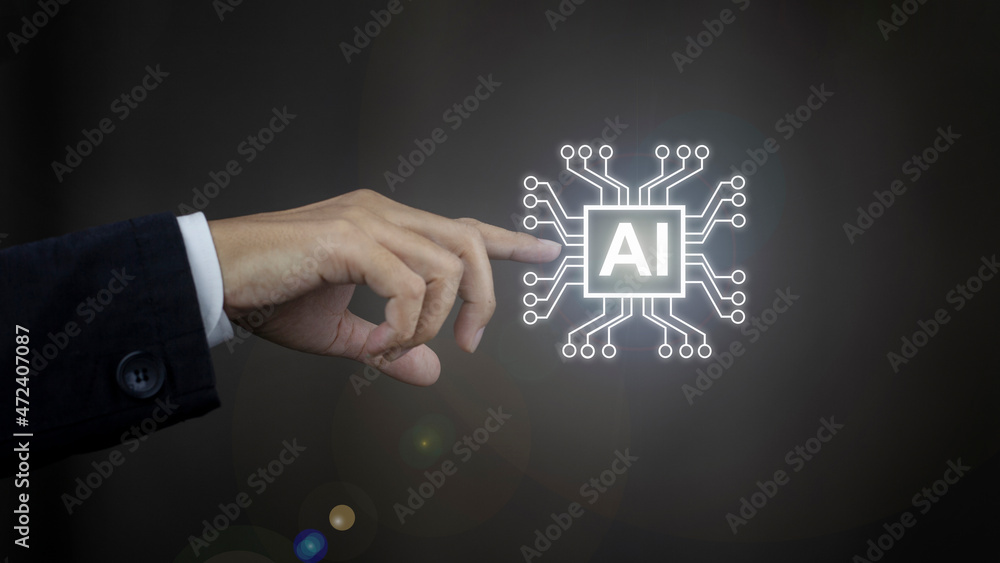 Naklejka premium Hud and innovation concept, Businessman hand pointing at abstract blue AI chip on blurry background. 