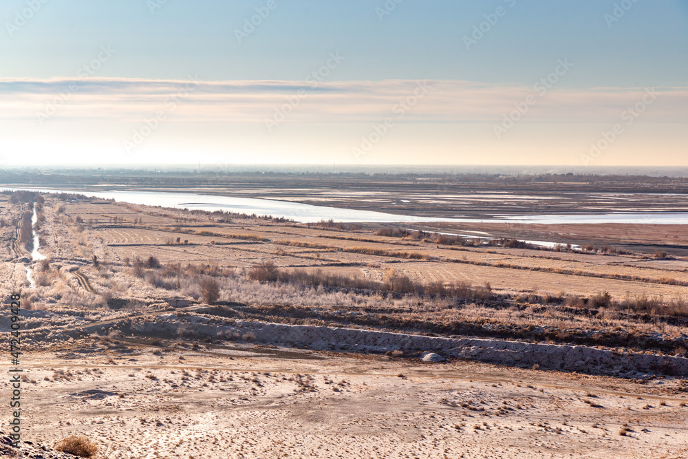Beautiful view at the top of Chilpyk Kala (or Chilpik Dakhma) on Amu Darya river. Karakalpakstan, Uzbekistan. Beautiful view at the top of Chilpyk Kala (or Chilpik Dakhma) on Amu Darya river. Karakalpakstan, Uzbekistan.