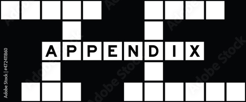 Alphabet letter in word appendix on crossword puzzle background