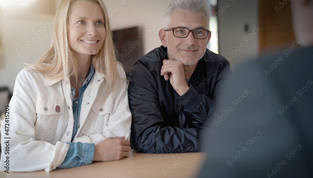 Fototapeta premium 40-year-old couple on a date for a real estate purchase