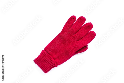 Top view red glove isolated on white background.