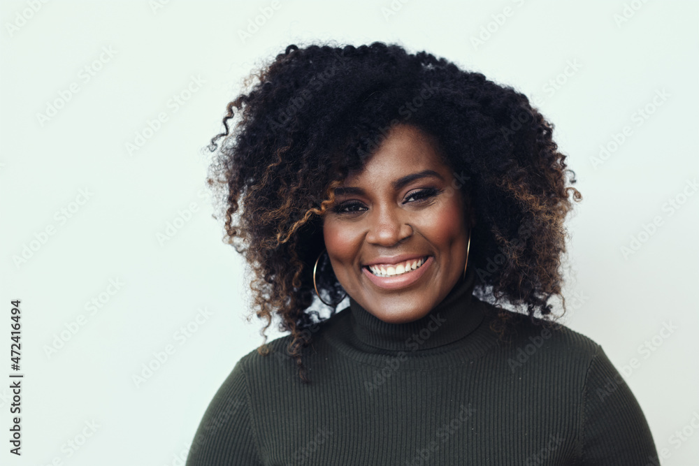Fototapeta premium Portrait Of Happy Young African American Woman With Curly Hair