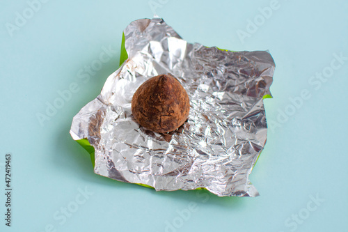 bitter chocolate candies truffle in cocoa, cocoa candies with a minimum amount of sugar, closeup of chocolate candies
