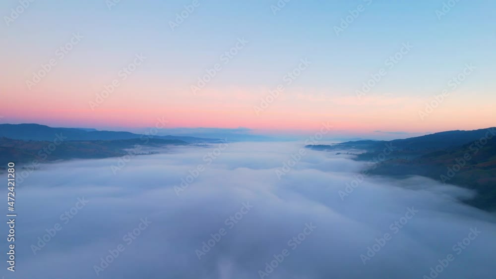 4K Drone flight over the clouds during sunrise. Sun is rising above sea of clouds until the horizon, bright weather and amazing nature landscape
4K Drone flight over the clouds during sunrise. Sun is rising above sea of clouds until the horizon, bright weather and amazing nature landscape
