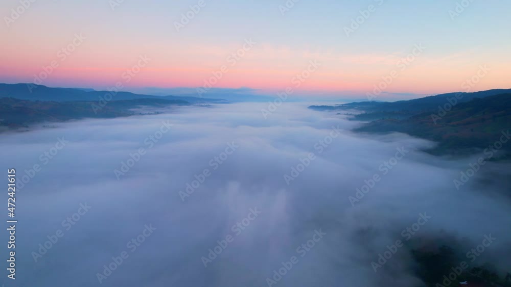 4K Drone Flying in the clouds. Flying through the clouds during sunrise, Aerial top cloudscape view from drone
4K Drone Flying in the clouds. Flying through the clouds during sunrise, Aerial top cloudscape view from drone