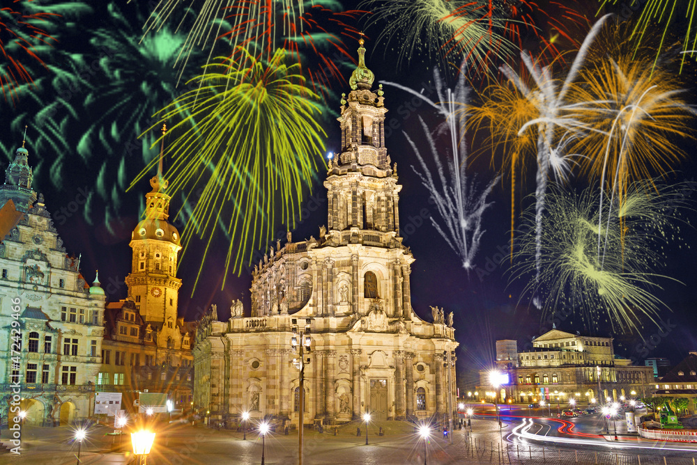 Beautiful bright colorful city landscape in the old city of Dresden, Germany in the festive New Year's fireworks
